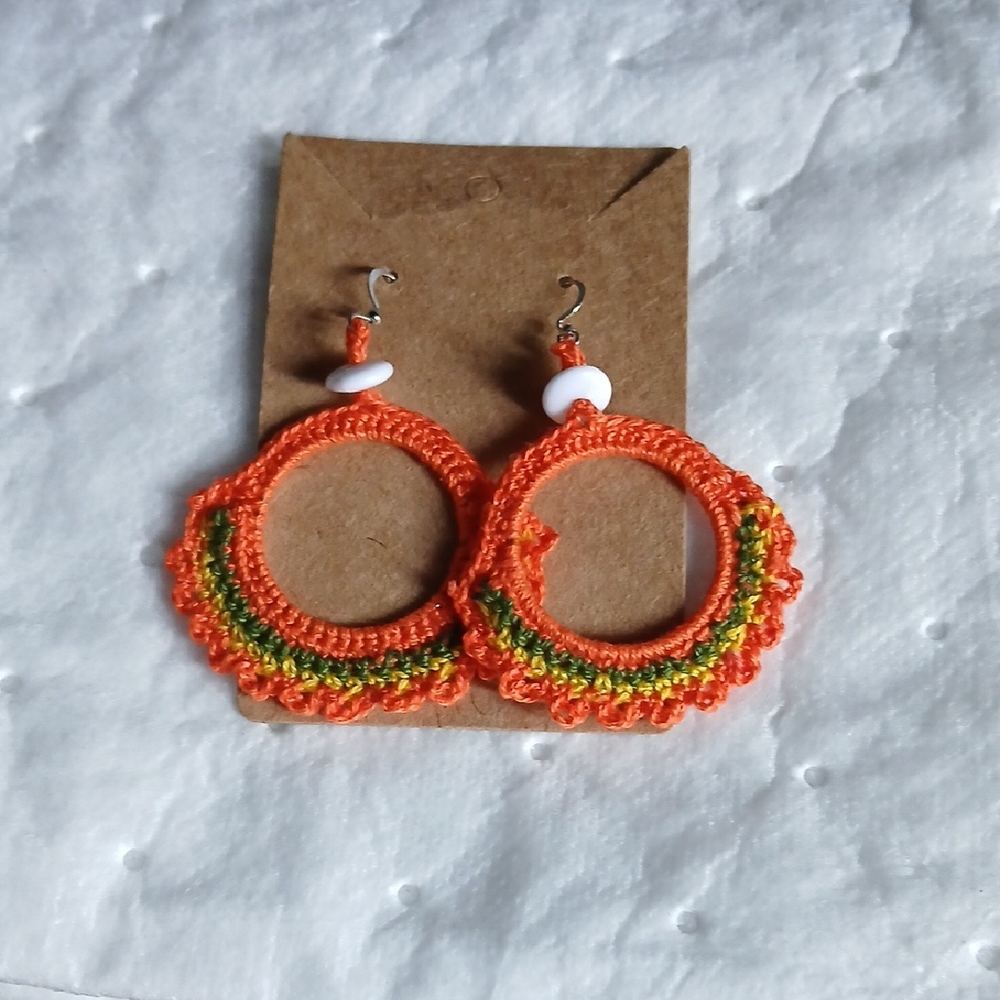 Handmade Orange Crochet Hoop Earrings with Green Accent